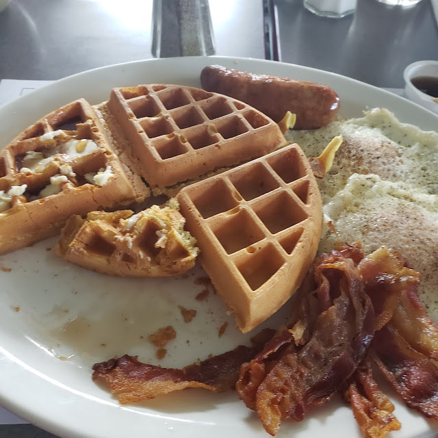 French Toast or Belgian Waffle Deluxe with Two Eggs Bacon Ham & Sausage