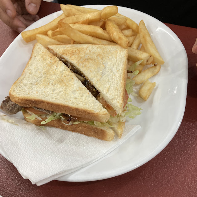 Steak Sandwich Served with Chips