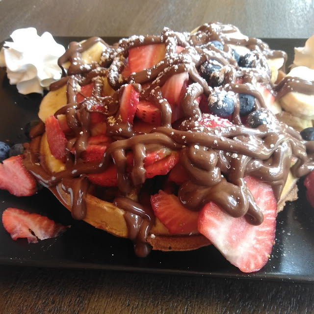 Waffle with Nutella Banana Strawberries and Blueberries