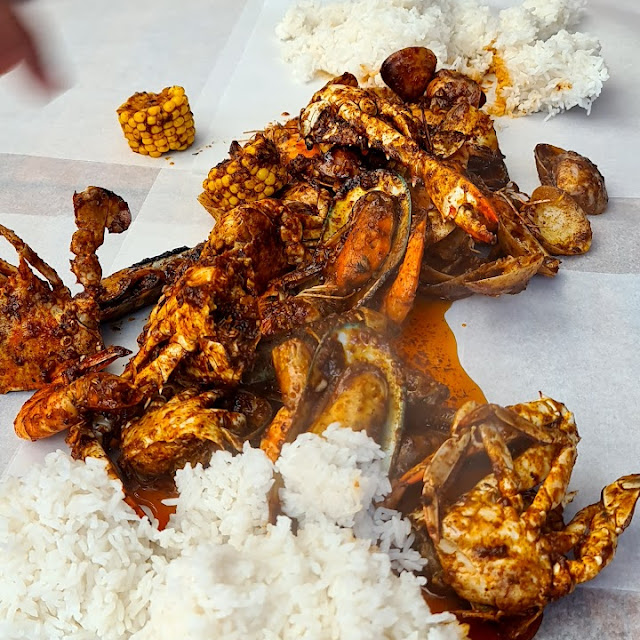 Dump-A-Feast Mixed Seafood in Cajun Sauce Served with Rice