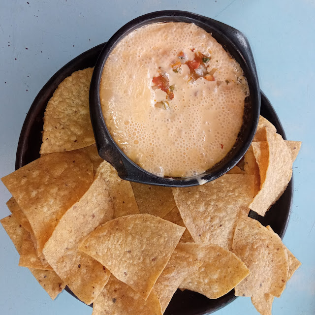Queso Sauce with Pork and Tortilla Chips