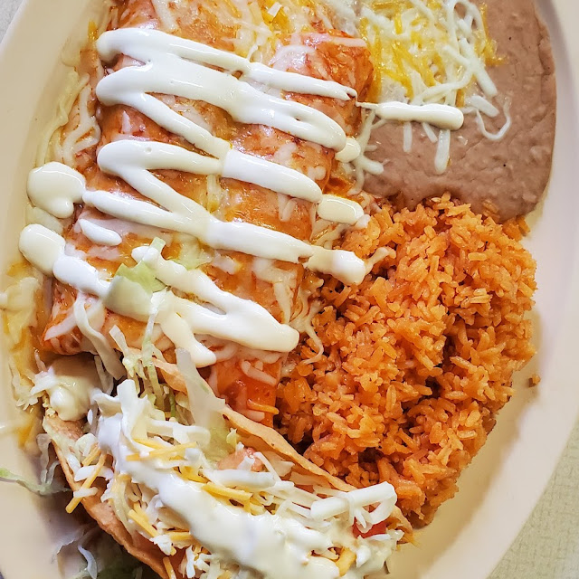 One Enchilada or Soft Taco with Rice