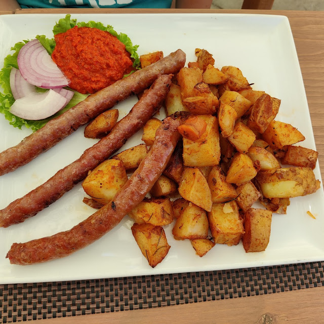 Homemade Sausages with Baked Potatoes