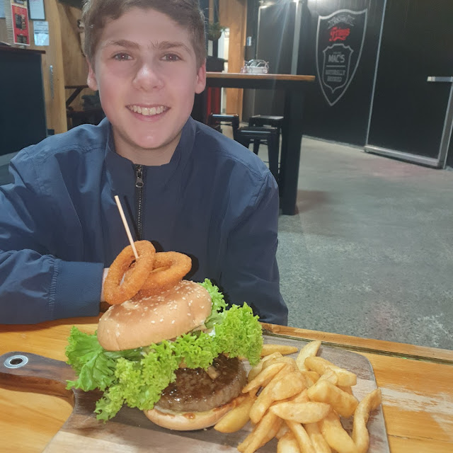Beef Burger Being Eaten by Twin 2