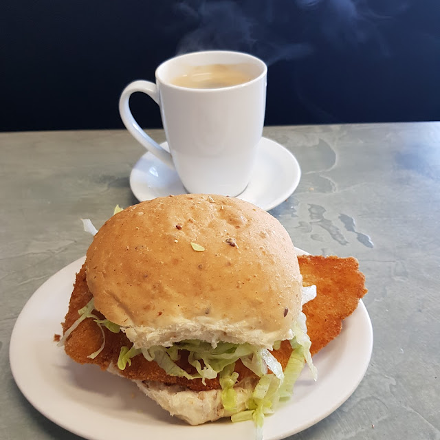 Chicken Shniztel Roll with Lettuce and Carrot and Coffee
