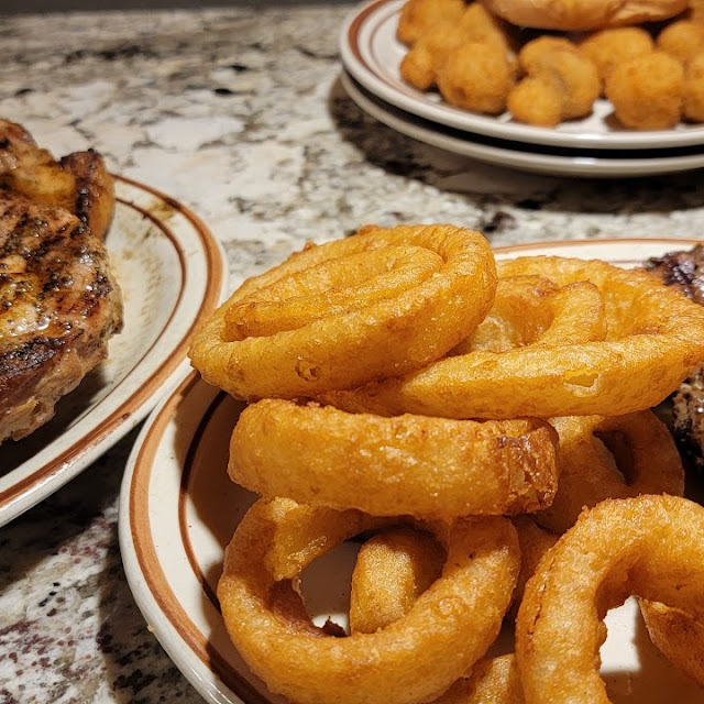 Pork Chops & Delmonico Ribeye w Onion Rings