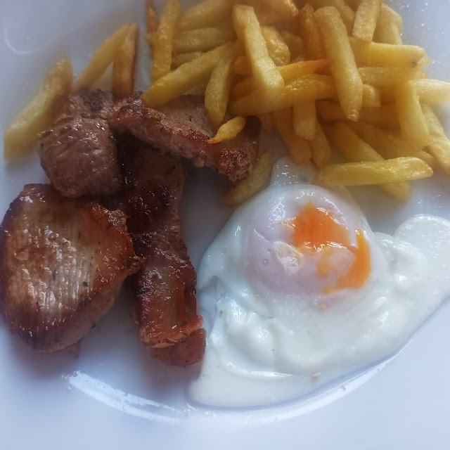 Secreto Con Patatas Y Huevo Frito
