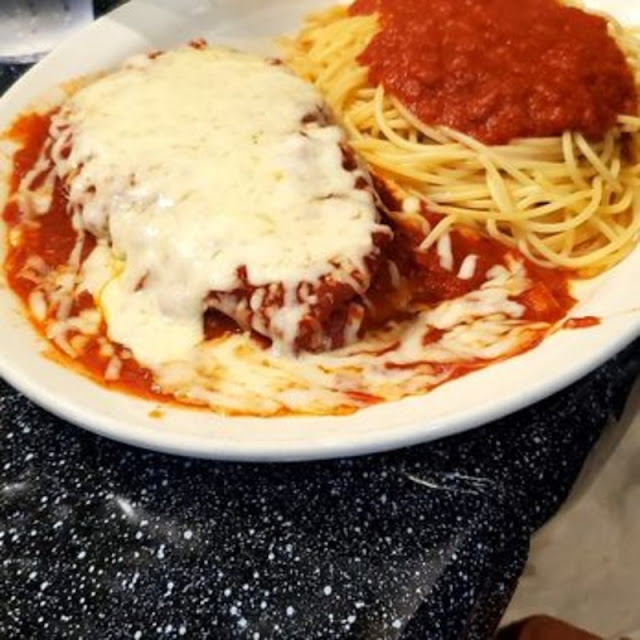 Our Custom Mixed Mozzerella and Cheddar Cheese and Signature Tomato Sauce