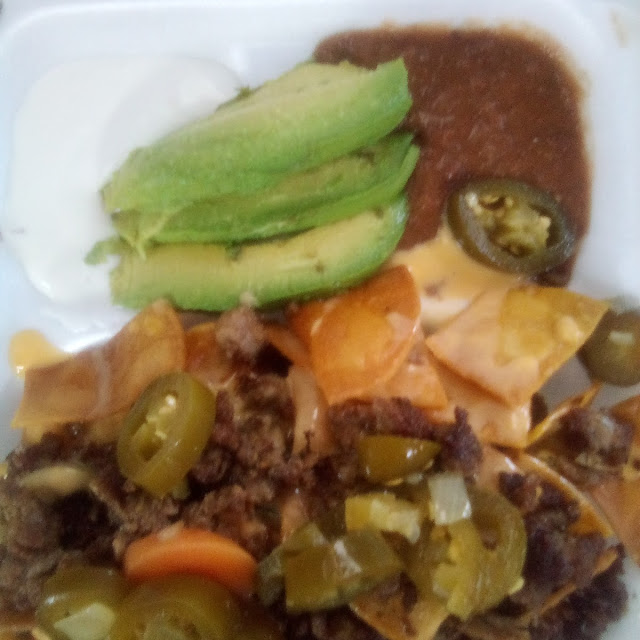 Nachos de Fajita Con Queso Amarillo Frijoles Refritos Aguacate Crema Jalapeños A 12 00