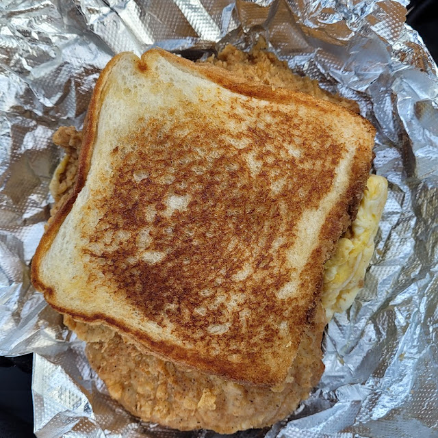 Fried Pork Chop Egg and Cheese Breakfast Sandwich