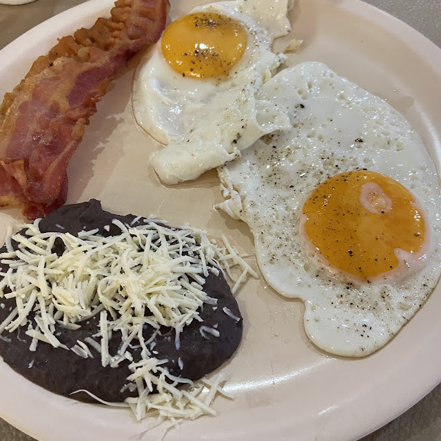 Eggs Bacon and Refried Beans and Cheese