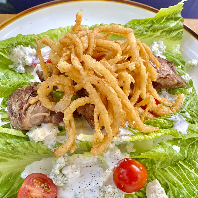 Calamari Friti Served with Lemon Aioli over Romaine Lettuce