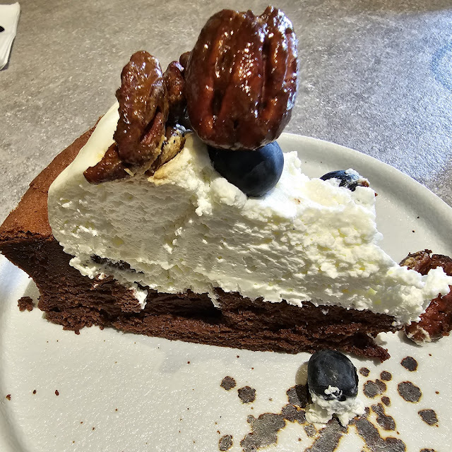 Messy Cake Chocolate Flourless Cake Topped with Mascapone Cheese Pecan Nuts & Blueberries
