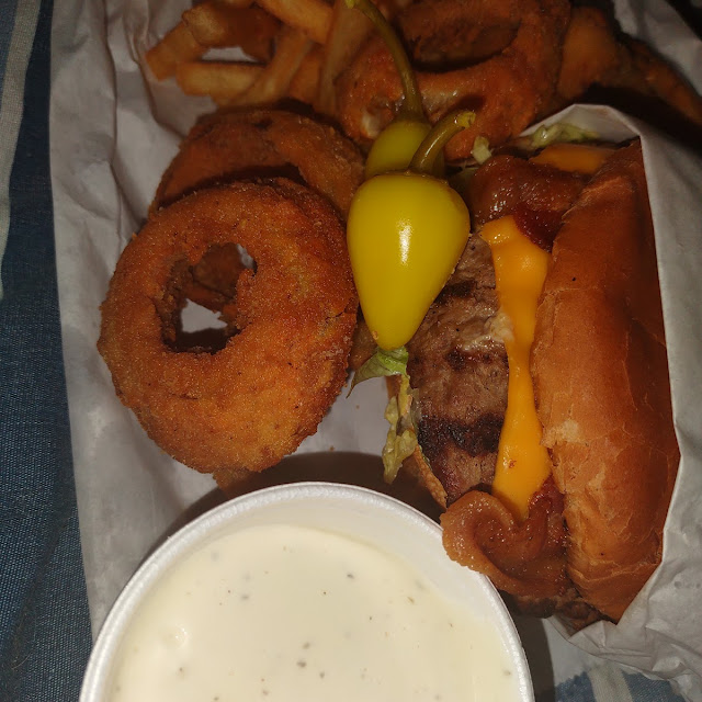 Double Bacon Cheeseburger Combo with Fries Onion Rings and Bananas Peppers
