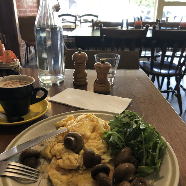 Scrambled Eggs Mushrooms and Rocket on Turkish Bread
