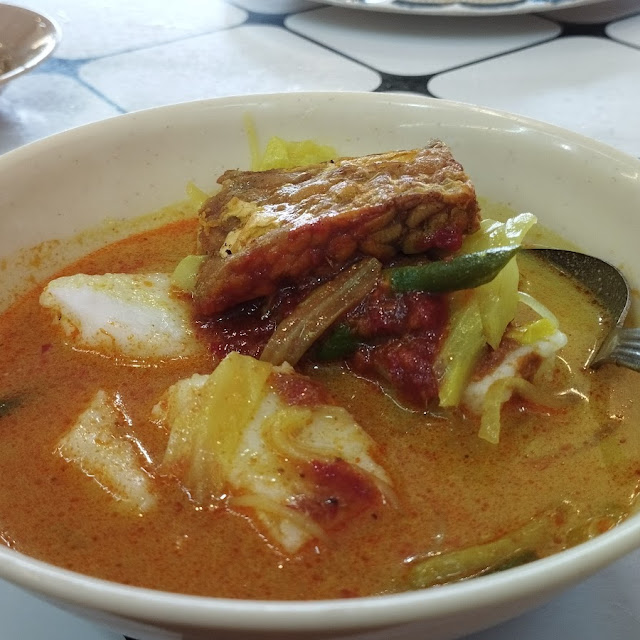 Lontong Sayur with a Slice of Added Tempe Goreng and Peanut Sauce