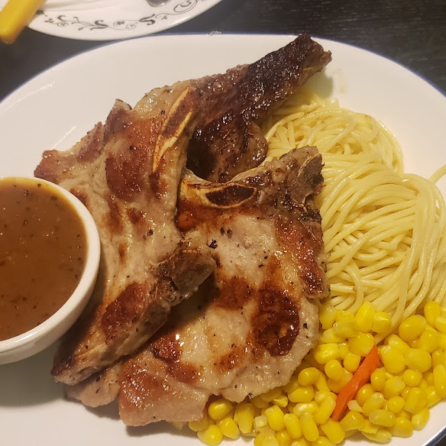 Pork Chop with Rice in Onion Sauce