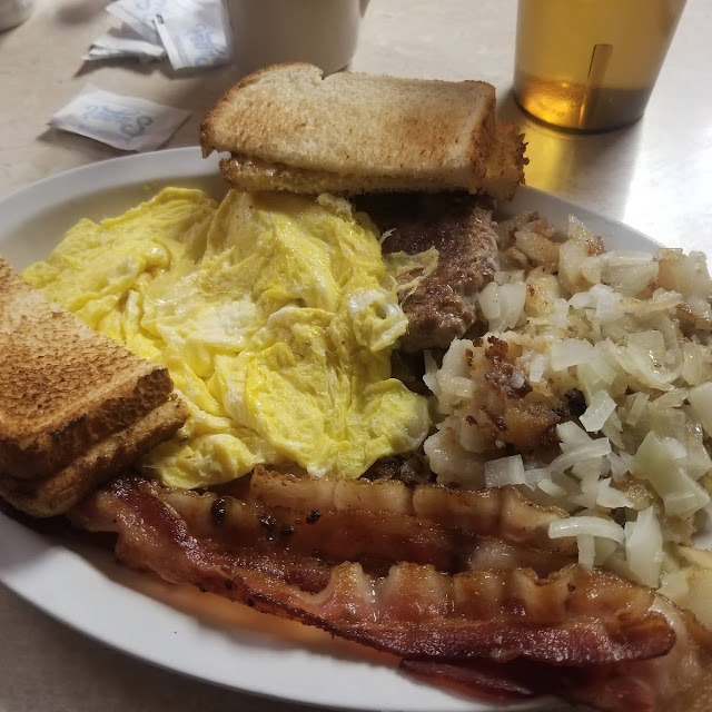 2 Eggs Hash Brown Potatoes Three Meat and Toast