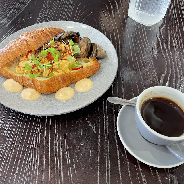 Chili Scramble Croissant and Coffee