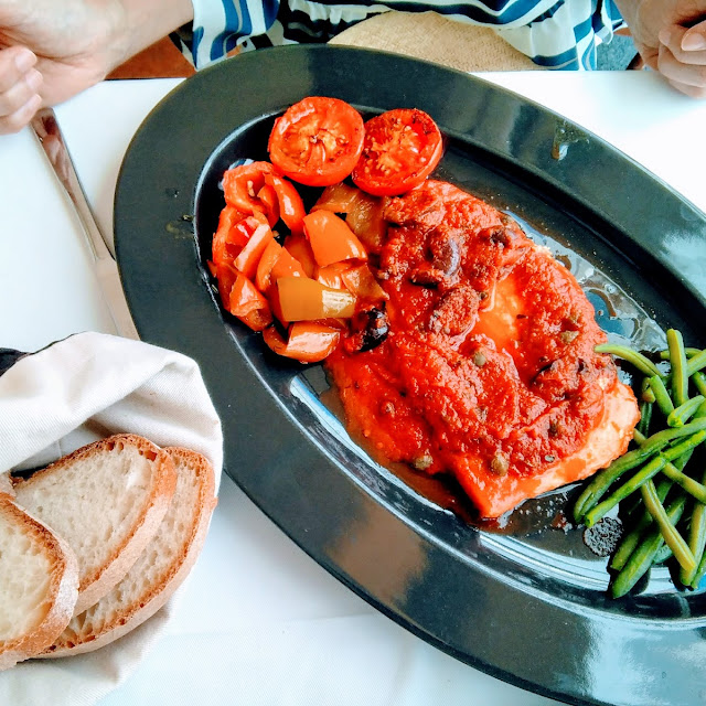 Swordfish with Tomato Sauce Olives Capers and Potatoes