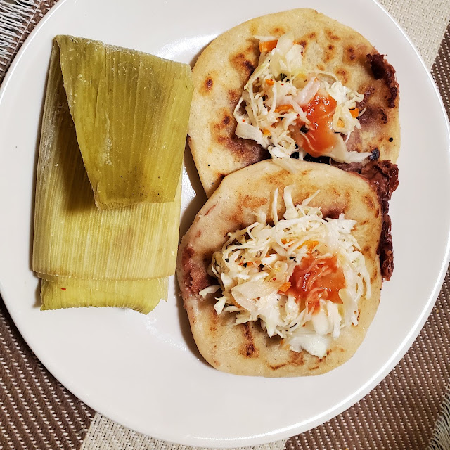 Bean Pupusas Topped with Curtido and Salsa with a Side of Elote Tamal