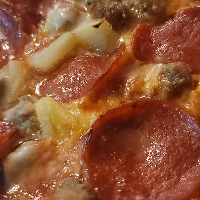 Pepperoni Sausage and Pineapple Pizza