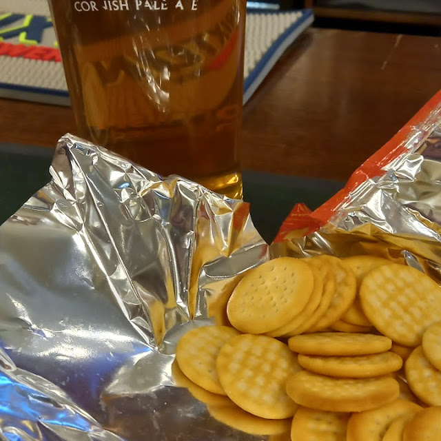 Tribute Cornish Pale Ale and a Packet of Mini Cheddars
