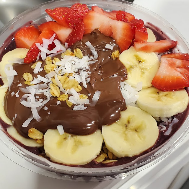 Acai Bowl with Strawberries Bananas Granola Nutella and Coconut